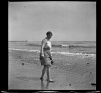 Mary West stands on the beach, Venice, about 1903