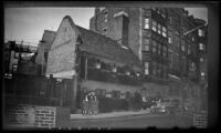 Mertie West and 2 others pose in front of the Paul Revere House, Boston, 1947