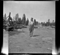 Mr. Cassel steps outside and poses, Burney Falls vicinity, 1917