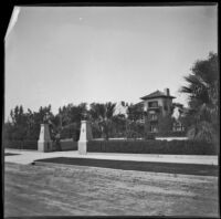 W. C. Stuart residence on Orange Grove Avenue, viewed from the street, Pasadena, 1899