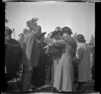 Leta French speaks to other attendees of the Iowa Picnic in Lincoln Park, Los Angeles, 1939