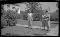 H. H. West, Jr., Anna West and Mertie West pose outside First United Methodist Church, Santa Barbara, 1947
