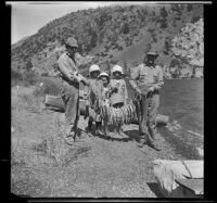 H. H. West, Frances West, Irene Schmitz, Elizabeth West and Albert Schmitz posing with fish, June Lake vicinity, 1914