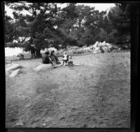 Family having a picnic by the 17-Mile Drive, Monterey, about 1898