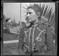 Close-up of Louise Ambrose posing in profile outside the Ambrose home, Los Angeles, about 1894