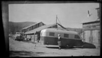 Mertie West poses in front of a Westcraft Trailer, Circle vicinity, 1946