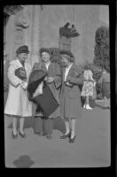 Frances Cline Greene, Frances West Wells and Mertie West stand outside the Glendale Southern Pacific Railroad Depot, Glendale, 1944