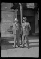 H. H. West and Evert West stand in front of Grauman's Chinese Theatre, Los Angeles, 1941