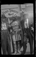 Will Witherby and H. H. West pose on Main Street in Disneyland, Anaheim, 1957