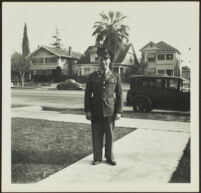 Gilbert Cecil West poses in uniform on H. H. West's front walk [print, recto], Los Angeles, 1941