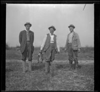 Charles Stavnow, Al Schmitz and Otto Schmitz, hunting rabbits, Palmdale vicinity, circa 1915