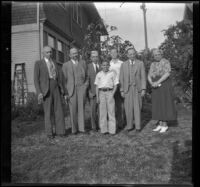 H. H. West stands in his backyard with his siblings, son, and nephew, Los Angeles, 1937