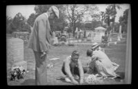 Members of the West family tend to George M. West and Wilhelmina West's graves, Los Angeles, 1936