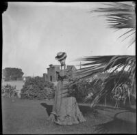 Myrtle Stockwell standing in Covina city park, Covina, 1900