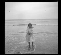 Elizabeth West walks in the surf, Venice, about 1907