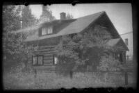 Log cabin house, viewed at an angle, Anchorage, 1946