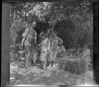 Glen Velzy, Frances West, Elizabeth West, Mary A. West and Bessie Velzy gathered in their campsite, San Gabriel Canyon, about 1915