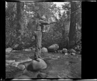 H. H. West fishing in Lee Vining Creek, Mono County, 1941