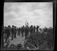 Servicemen perform a gun salute during Decoration Day services at Los Angeles National Cemetery, Los Angeles, about 1895