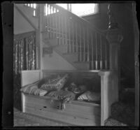 Stairway and bench in the Brown's home, Los Angeles, about 1900