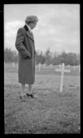 Mertie West stands beside the grave of Kermit Roosevelt, Fort Richardson, 1946