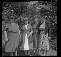 Lettice Chapman Reid, Lena Brigham, Lizzie Ritchie Geddes and Alice Riley Tallman pose at the Pioneer Picnic held in Sycamore Grove Park, Los Angeles, 1940