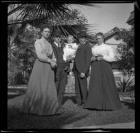 Josie, William, and Lester Shaw stand in their front yard with Abraham and Mary Whitaker, Los Angeles, about 1896