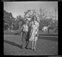 Richard and Dorothea Siemsen stand on the West's front lawn, Los Angeles, 1939