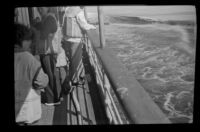 Ship's crew members engage in a fire drill, Alaska en route, 1946