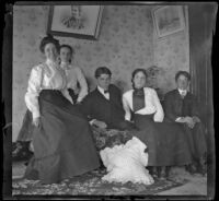 Mertie Whitaker perches on a couch with her brothers, Otto and Guy, and the Brown sisters, Los Angeles, about 1898