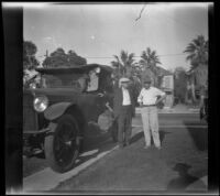 H. H. West and William Shaw stand next to West's car while H. H. West Jr. leans out the window before departure for Twin Lakes, Los Angeles, 1929