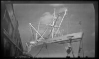 Del Norte, docked at the wharf and viewed from below, New Orleans, 1947