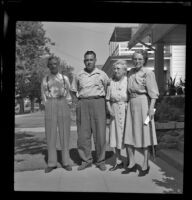 Charles Longstreet, Sam Longstreet, Mrs. Charles Longstreet and Mrs. George Pawley pose outside the Pawley residence, Pasadena, 1948