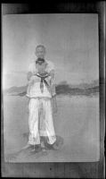 Elizabeth West and Wilfrid Cline pose on the beach at Abalone Point, Laguna Beach vicinity, about 1917