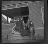 H. H. West and his siblings pose on their front porch with their cousin, William Mead, Los Angeles, about 1900