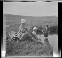 Bessie Velzy, Elizabeth West, Minnie West and Frances West enjoy Whitmore Tub, Mammoth Lakes vicinity, 1914