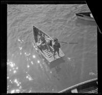 Two boys on a boat, Santa Catalina Island vicinity, about 1910