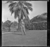 H. H. West stands in Alhambra Park, Alhambra, 1933