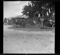 A. B. Schmitz's Moon and H. H. West's Buick parked in front of old Freeman Station in Dove Springs, Kern County, 1914