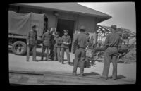 Soldiers stand by the tracks at the Southern Pacific Railroad depot, San Luis Obispo, 1942