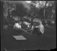 Guy Whitaker and Forrest Whitaker play a game with other men in Victory Park, Los Angeles, 1931