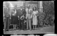 Richard Siemsen, Frances West Wells, H. H. West, H. H. West, Jr. and Mrs. H. H. West, Jr. pose on the lawn outside a church, Los Angeles, 1946