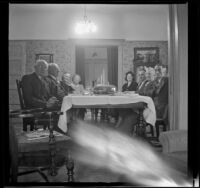 H. H. West and Mertie Whitaker West's family sit at the Thanksgiving table, Los Angeles, 1942