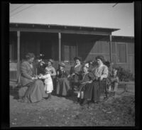 The Nelsons, Salbachs and Wests pose for a photograph on Thanksgiving Day, Orange County vicinity, 1912