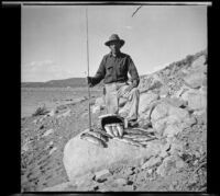 H. H. West poses with trout he caught in Grant Lake, Mono County vicinity, 1929