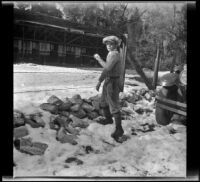 H. H. West, Jr. gets ready to throw a snowball, Redlands vicinity, about 1930