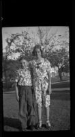 Richard and Dorothea Siemsen stand on the West's front lawn, Los Angeles, 1939