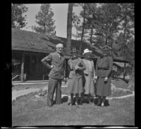 Forrest Whitaker, Mertie West, Josie Shaw and Agnes Whitaker pose outside Tahquitz Lodge, Idyllwild, [circa 1942]