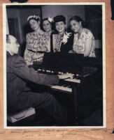 Haven Johnson playing piano for a group of women, Los Angeles, 1940s