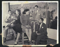 Informal gathering at the bar in Walter Gordon's office, Los Angeles, 1940s